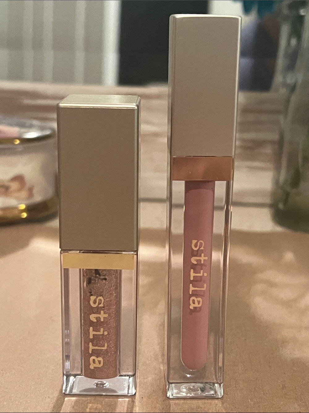 NWOB Stila Gloss in Casual Friday and Glitter and glow Highlighter in Kitten